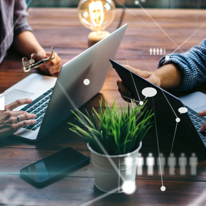 Group of young business people working together on a project. Ne